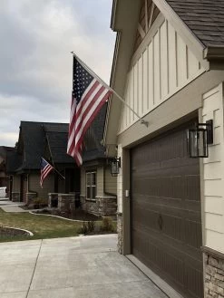 Aluminum Spinning Pole (Single Piece) -Flags and Banners Store spinning pole on garage with americna falg