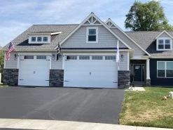 Aluminum Spinning Pole -Flags and Banners Store spinning poles on house with american.pow . army